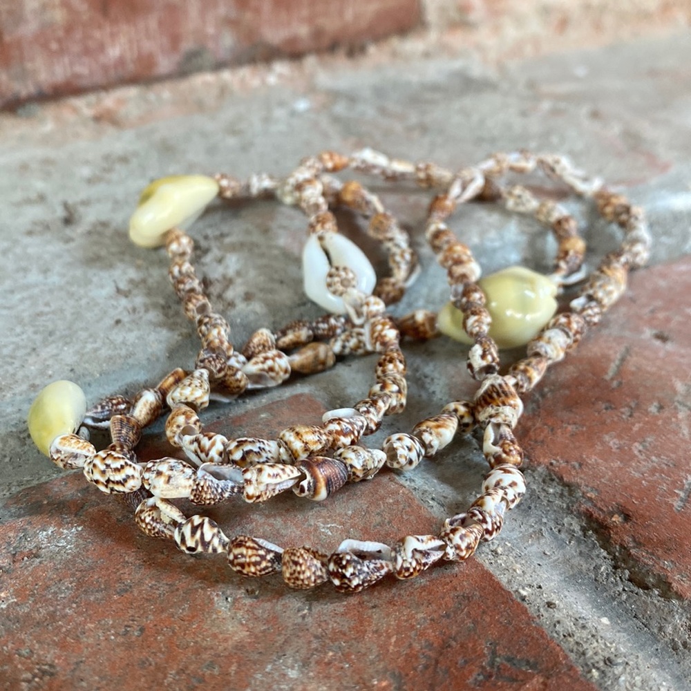Long puka shell necklace